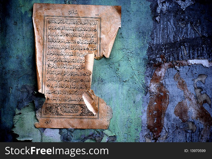 Page from the Koran hanging on a wall in Istanbul, Turkey.