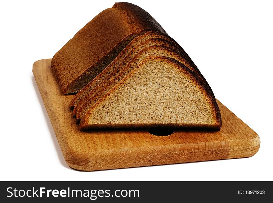 Rye bread on a breadboard isolated on a white