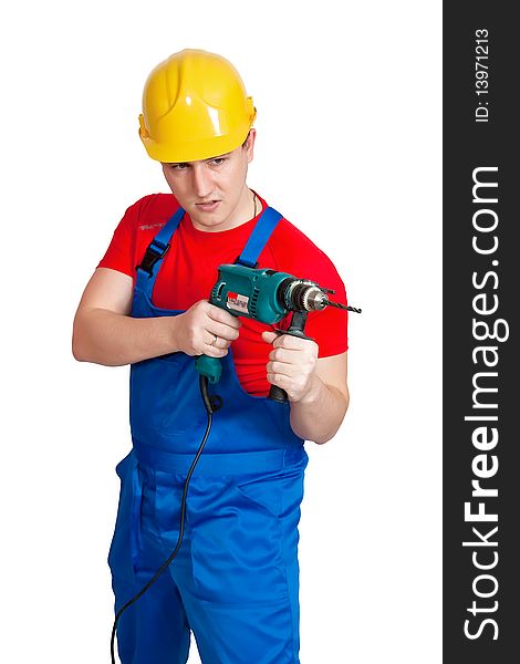 The nagging worker in uniform and hardhat with drill. The nagging worker in uniform and hardhat with drill.