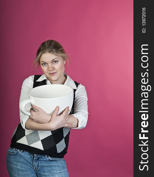 Young girl with extra large cup