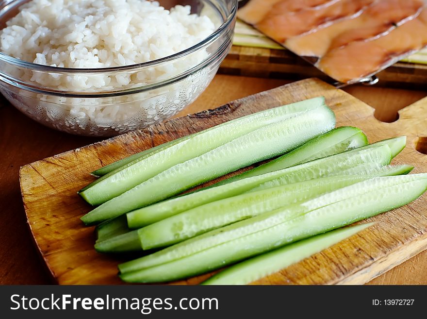 An image of green cucumber and rice. An image of green cucumber and rice