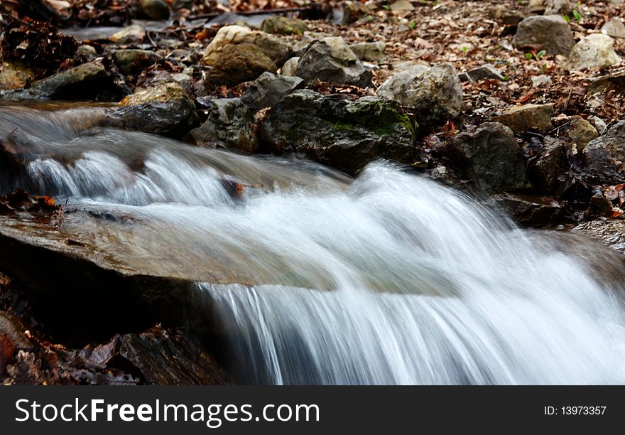 Snow thawing leads to education of mountain streams. Snow thawing leads to education of mountain streams