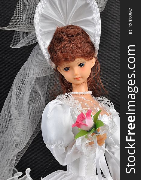 A bride doll in white dress