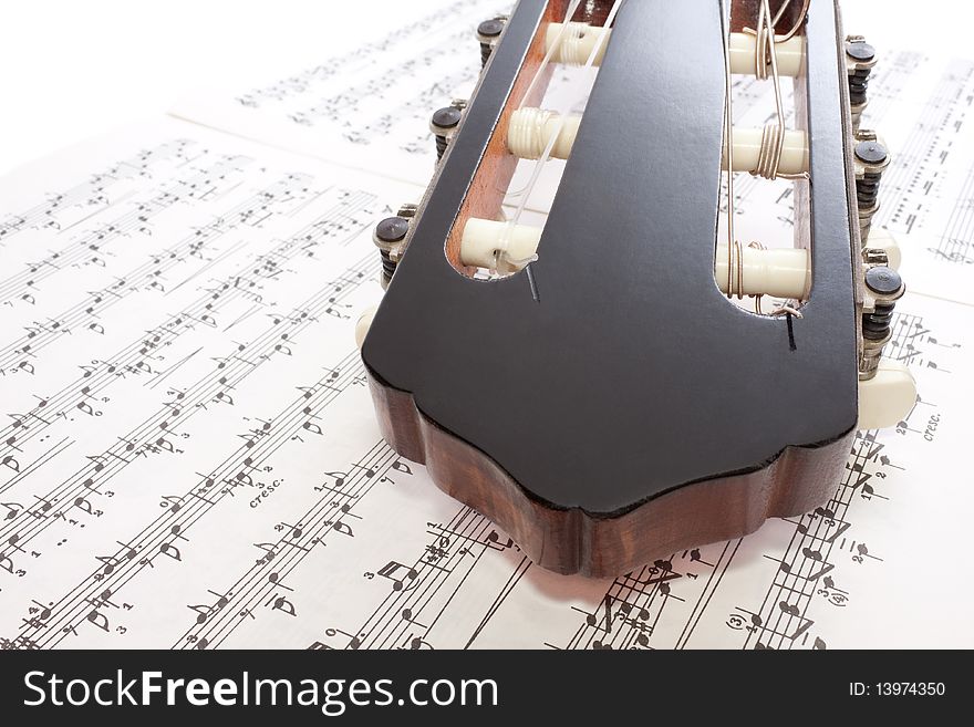 Closeup Classical Guitar Headstock and Notes. Closeup Classical Guitar Headstock and Notes