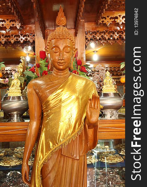 Image of buddha make from wood. Image of buddha make from wood