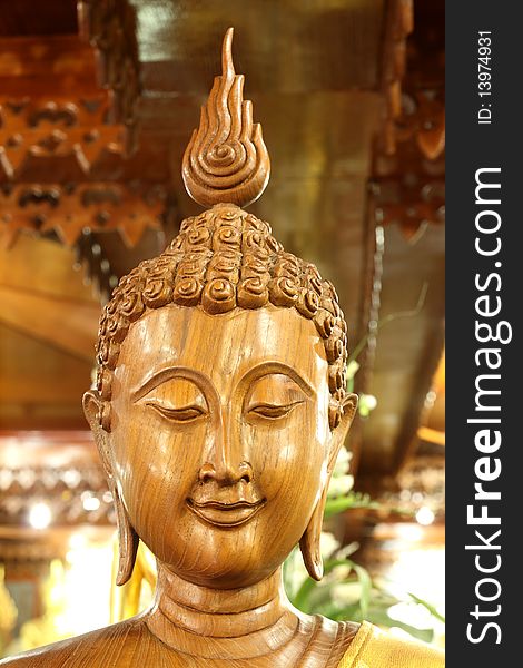 Image of buddha make from wood. Image of buddha make from wood