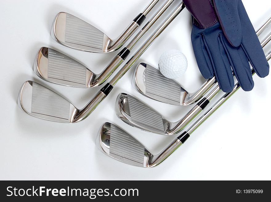 Golf clubs with glove on white background. Golf clubs with glove on white background