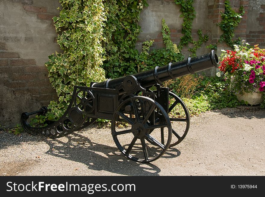 Old cannon near castle wall