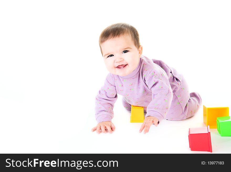 Happy child with bricks isolated on white. Happy child with bricks isolated on white