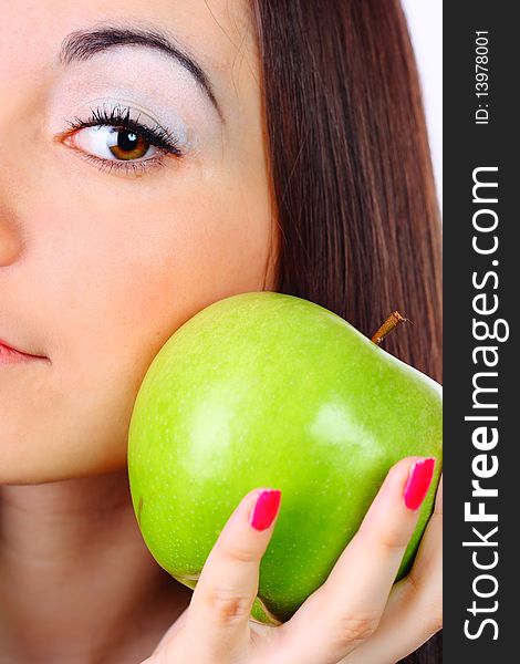 Young girl holding a green apple. Young girl holding a green apple