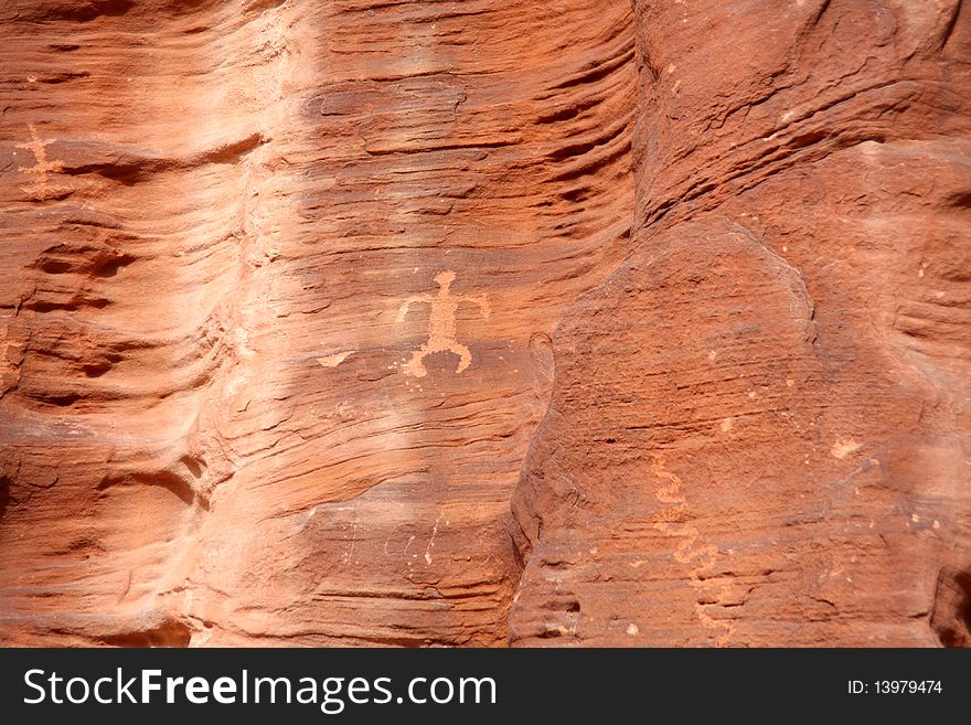Petroglyph carved into a rock wall at Valley of Fire