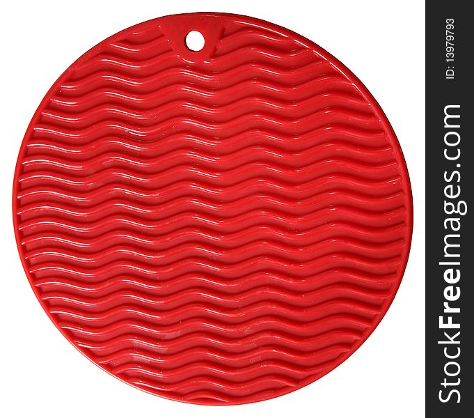 Round red Silicone oven pad over white.