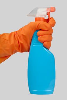 Gloved Hand With Plastic Bottle Spray Spraying Royalty Free Stock Image