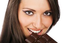 Portrait Of Young Smiling Woman Eating Chocolate Royalty Free Stock Photos Portrait Of Young Smiling Woman Eating Chocolate Royalty Free Stock Photos