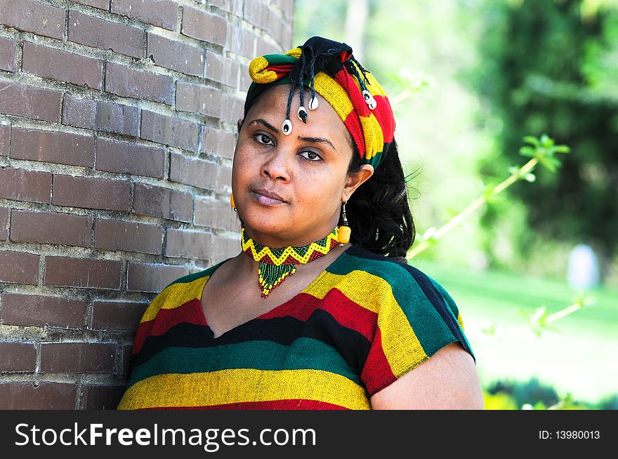 Beautiful Ethiopian young woman wearing traditional Ethiopian style tribal clothes. Beautiful Ethiopian young woman wearing traditional Ethiopian style tribal clothes