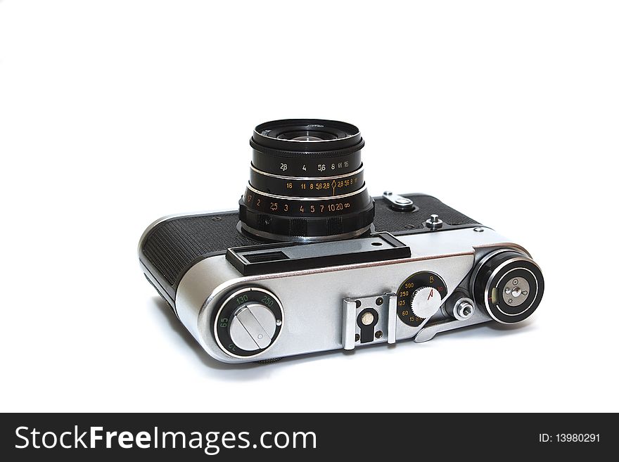 Photo of the old film camera on white background