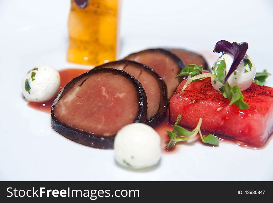 Appetizing starter with cold cut, cream and watermelon. Appetizing starter with cold cut, cream and watermelon