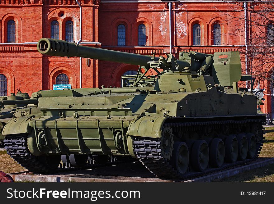 Soviet union battle tank near the red building. Soviet union battle tank near the red building
