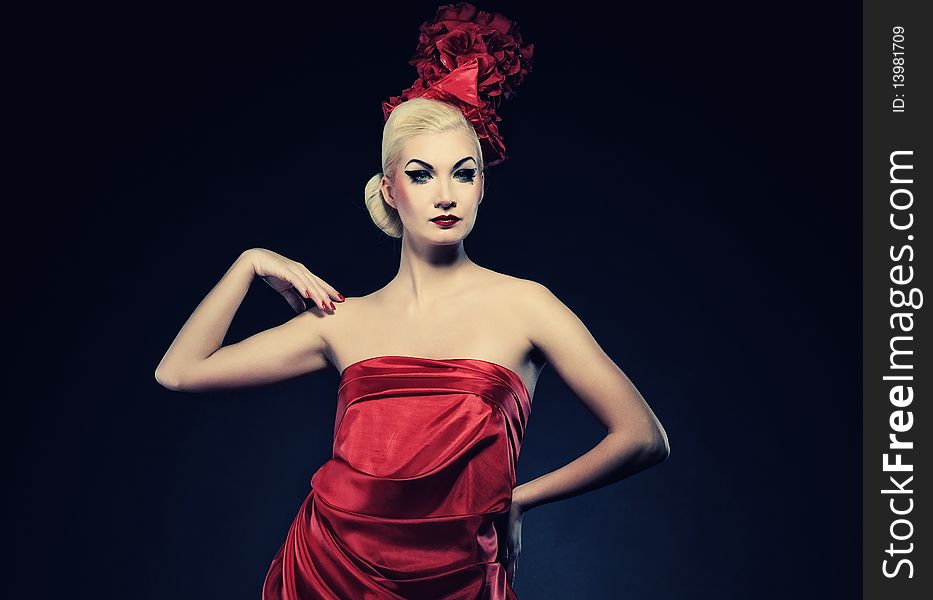 Portrait of a beautiful lady in red hat