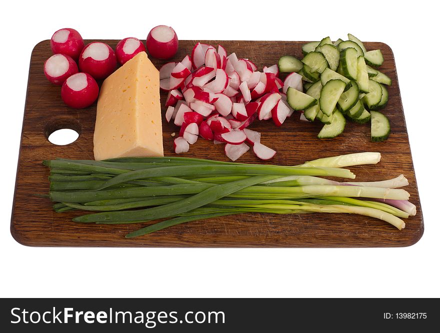 Salad ingredients on the wooden board