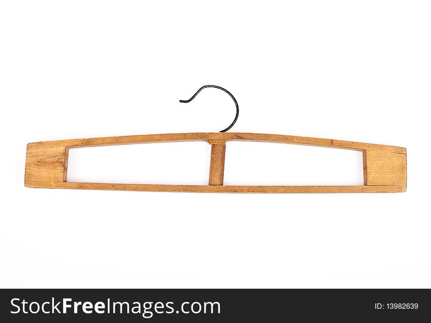 Old wooden hanger on white