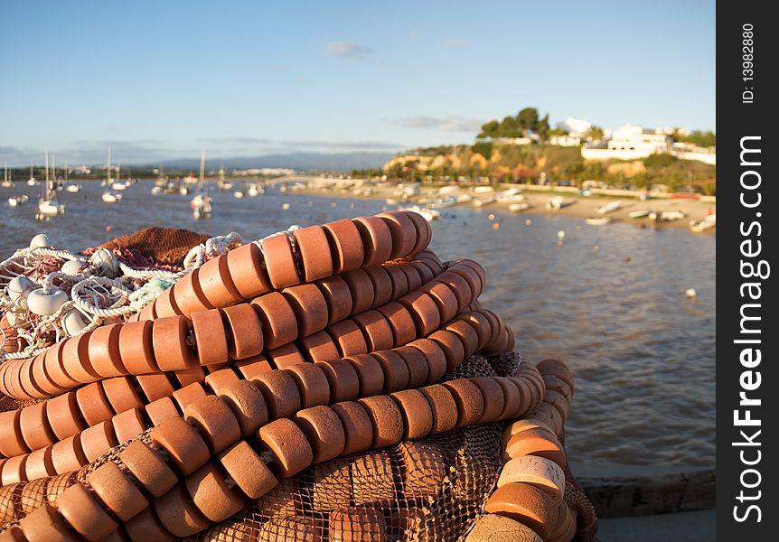 Fishing nets with Alvor in the background.