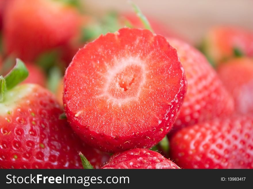 Sliced  strawberries in the basket. Sliced  strawberries in the basket.