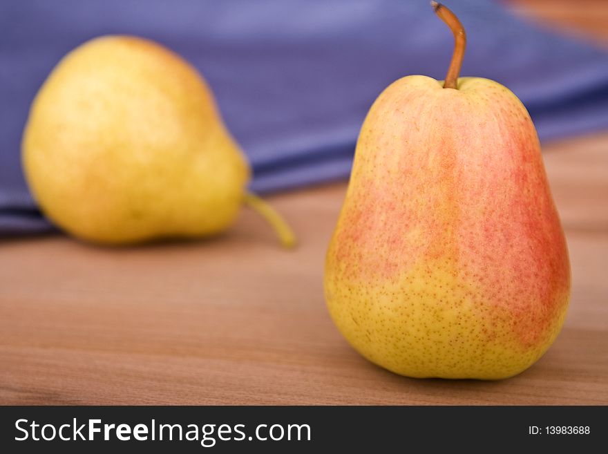 Close-up of a pear on a cutting board. Close-up of a pear on a cutting board