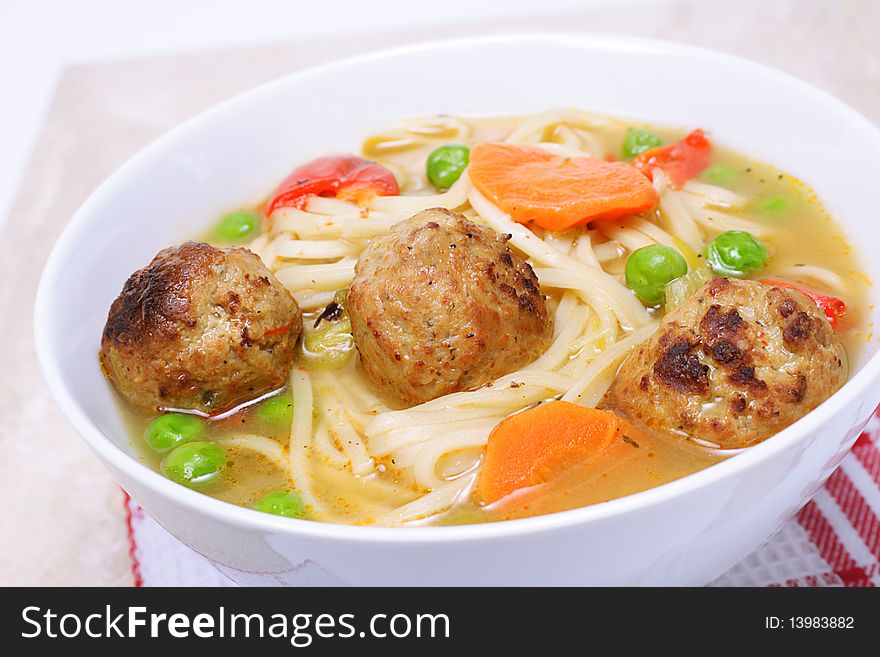 Garden fresh vegetables in flavorful chicken broth, oriental style noodles topped with lean meatballs. Garden fresh vegetables in flavorful chicken broth, oriental style noodles topped with lean meatballs