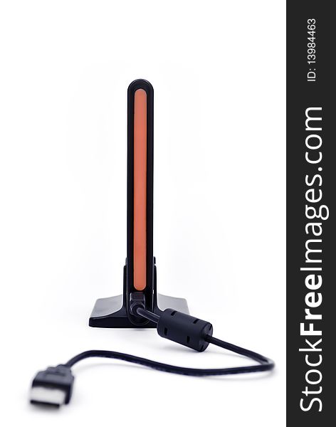 Portable hard drive on a stand in profile. Portable hard drive on a stand in profile