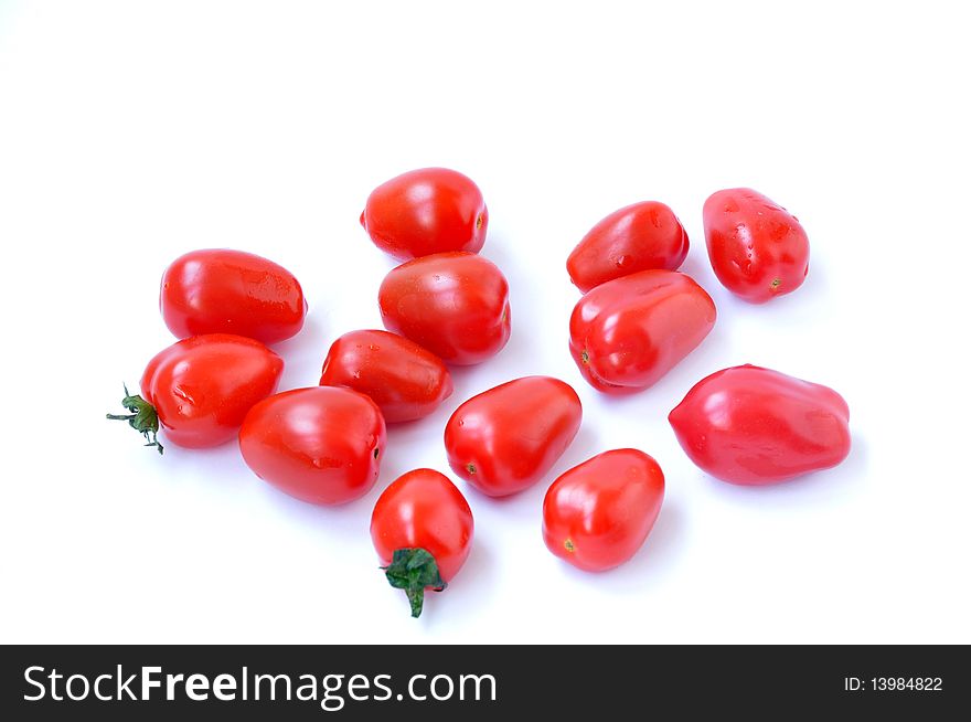 Cherry tomatoes isolated on white background.