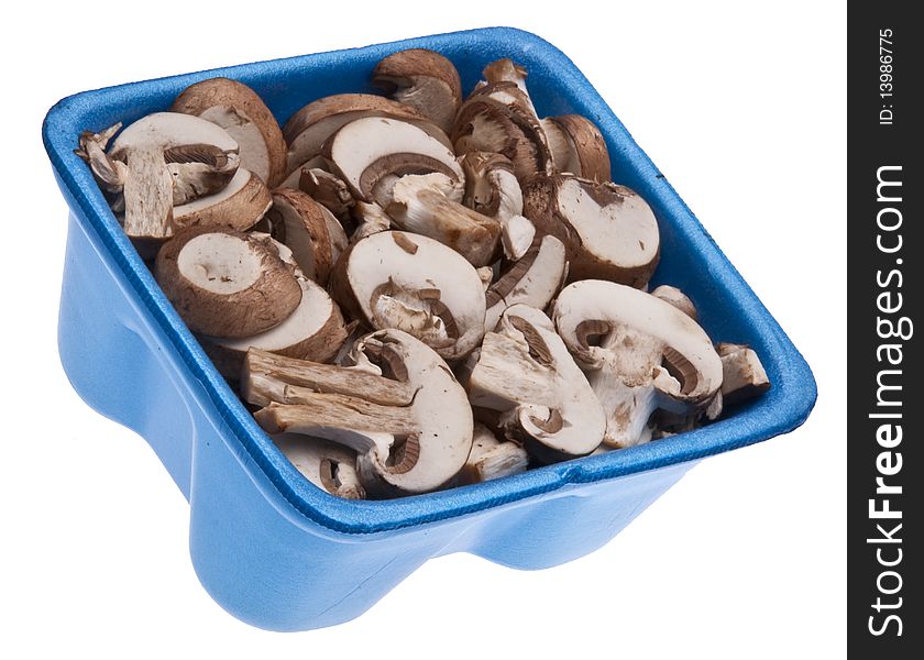 Fresh Mushroom Slices in Foam Grocery Container Isolated on White with a Clipping Path.
