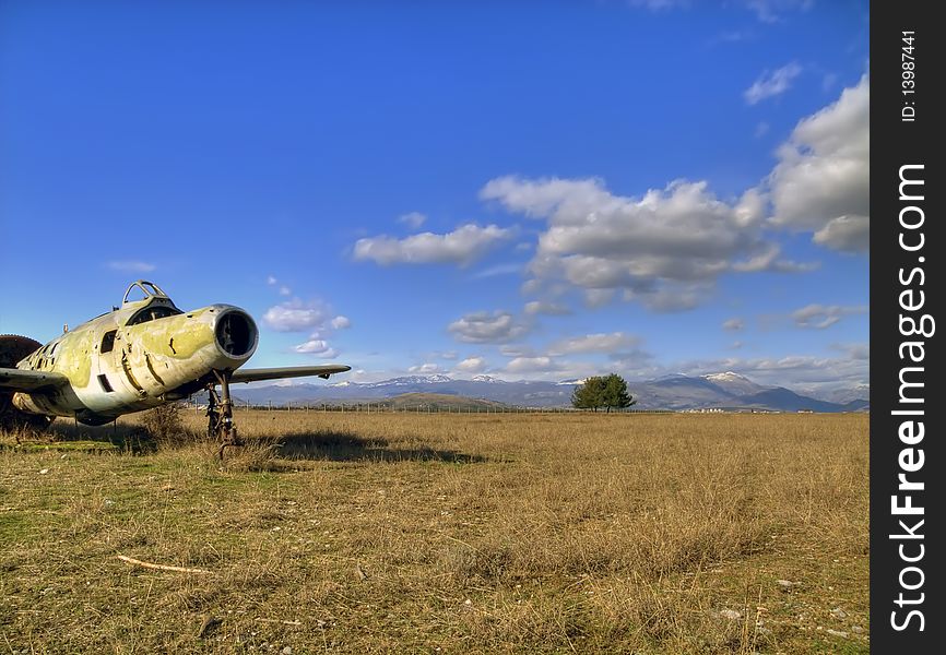 Alone aeroplane on the lawn.