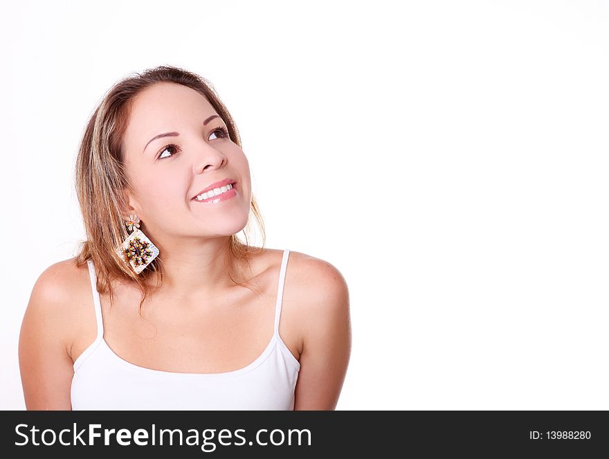 Woman smiling and  looking up over white background. Space to insert text or design. Woman smiling and  looking up over white background. Space to insert text or design