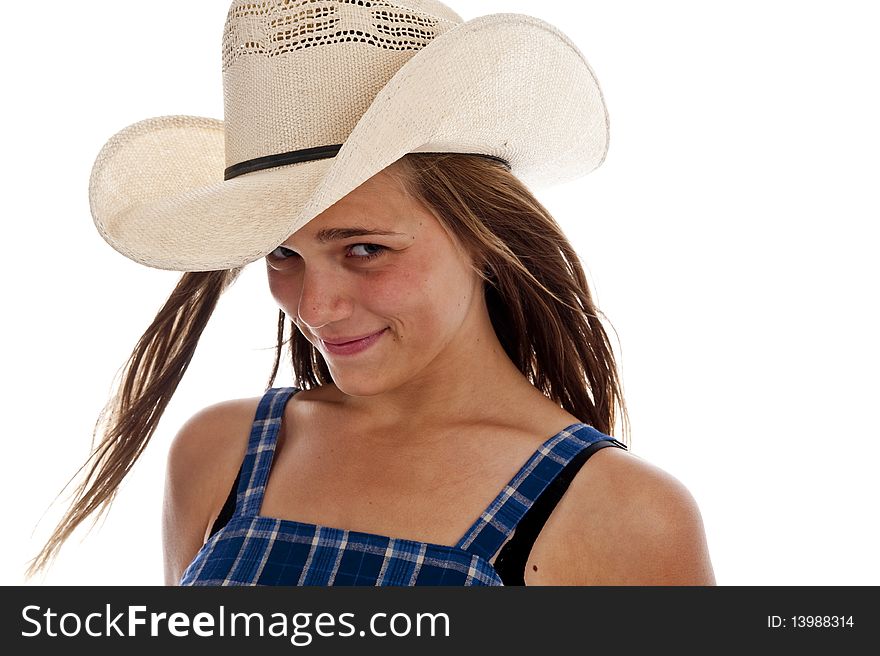 Pretty teen girl wearing an old straw hat. Pretty teen girl wearing an old straw hat