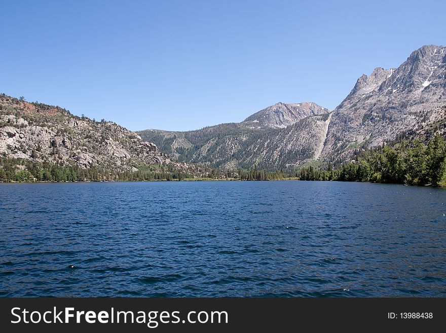 Scenic lake by Sierra Nevada mountain range