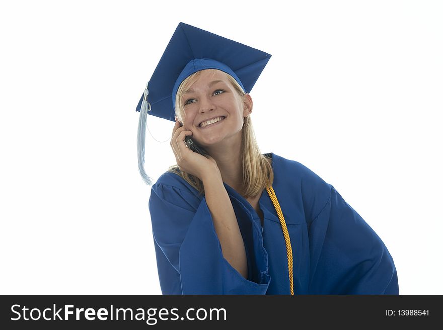 Happy pretty girl graduate in gown talking on mobile phone. Happy pretty girl graduate in gown talking on mobile phone