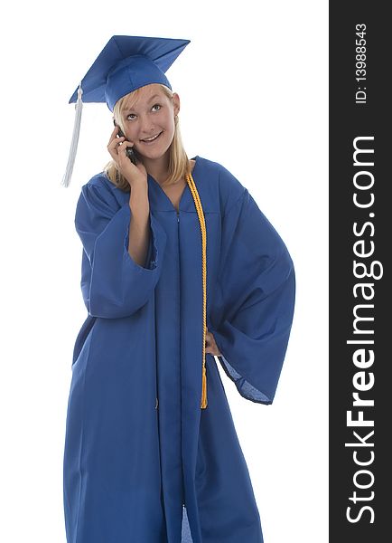 Happy pretty girl graduate in gown talking on mobile phone. Happy pretty girl graduate in gown talking on mobile phone