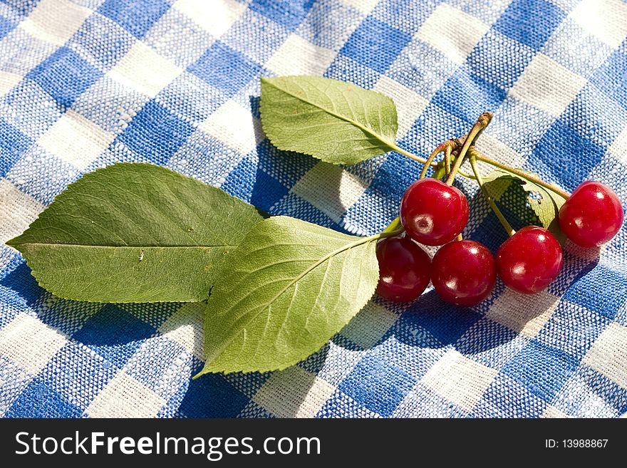 Food series: freshly grown tasty cherries on napkin. Food series: freshly grown tasty cherries on napkin