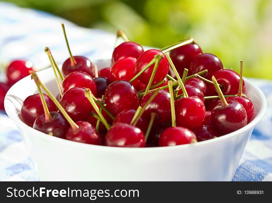 Food series: freshly grown tasty cherries on bowl. Food series: freshly grown tasty cherries on bowl