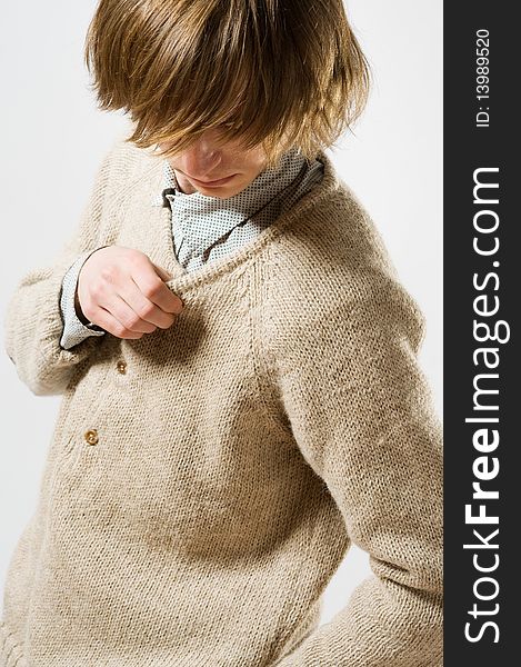 Waist up portrait of young man on light gray