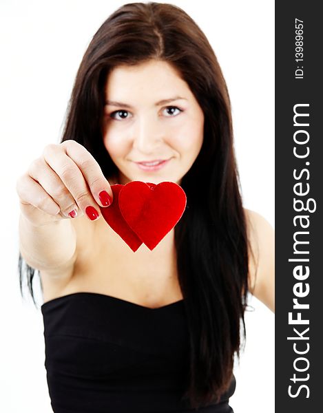 Girl holding a double heart. Girl holding a double heart