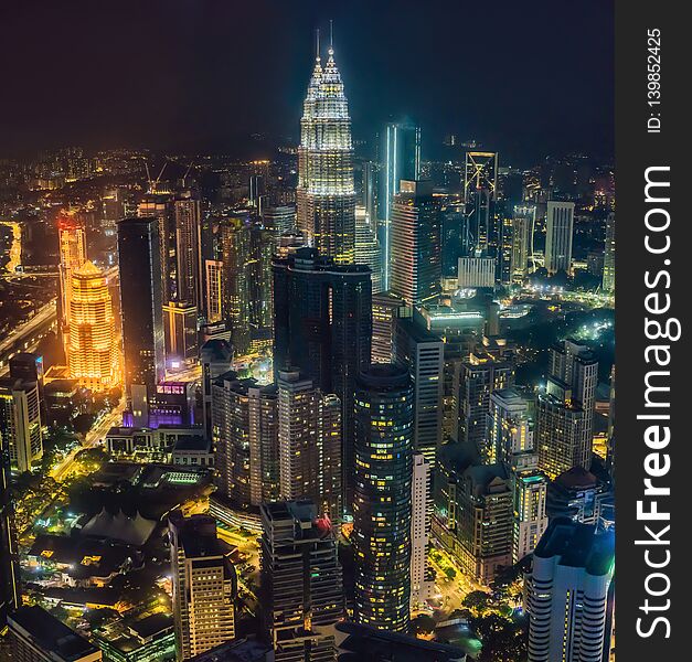 Kuala lumpur cityscape. Panoramic view of Kuala Lumpur city skyline at night viewing skyscrapers building in Malaysia.