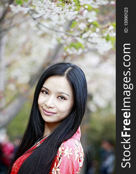 Beautiful Asian girl in cherry blossom season. Beautiful Asian girl in cherry blossom season.