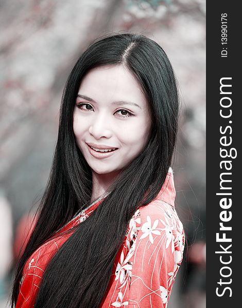 Beautiful Asian girl's portrait in cherry blossom season. Beautiful Asian girl's portrait in cherry blossom season.