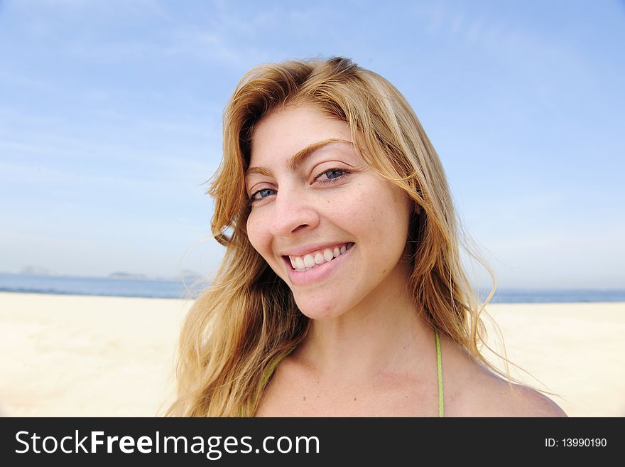 Beautiful blond woman enjoying the beach
