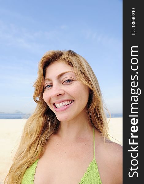 Beautiful Blond Woman Enjoying The Beach