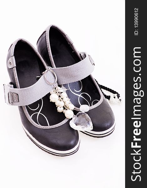 Shoe with black jewelery and facet stone. Shoe with black jewelery and facet stone.