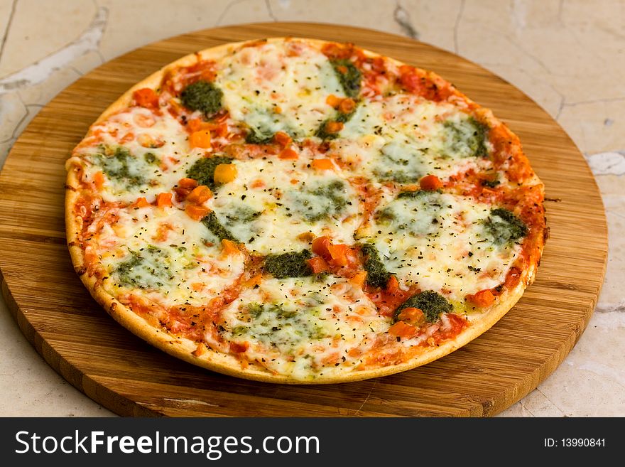Tasty pizza with Broccoli and Mozzarella