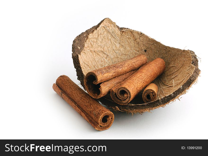 Delicious looking cinnamon with coconut peel/shell. Delicious looking cinnamon with coconut peel/shell.